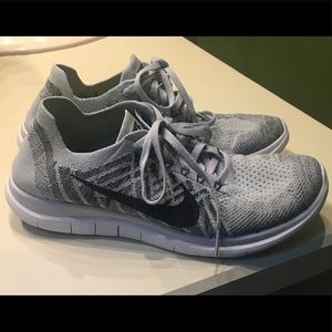 Nike Free 4 Flyknits size 8.5. Light gray.